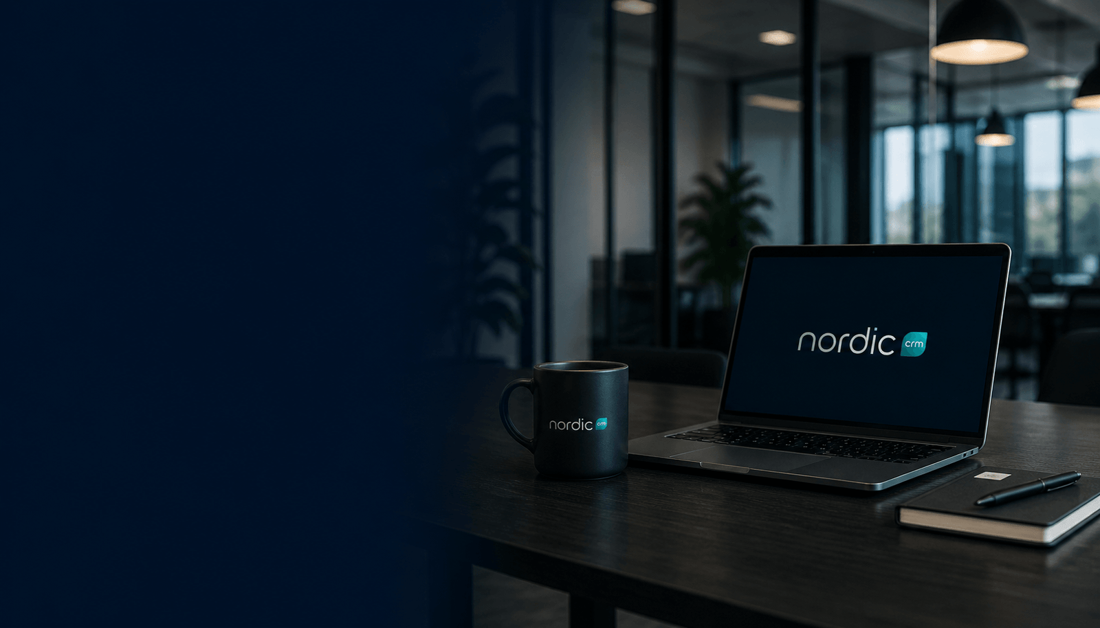 Moderne kontormiljø med laptop og Nordic CRM branding på skærm og kaffekop i mørk skandinavisk stil.