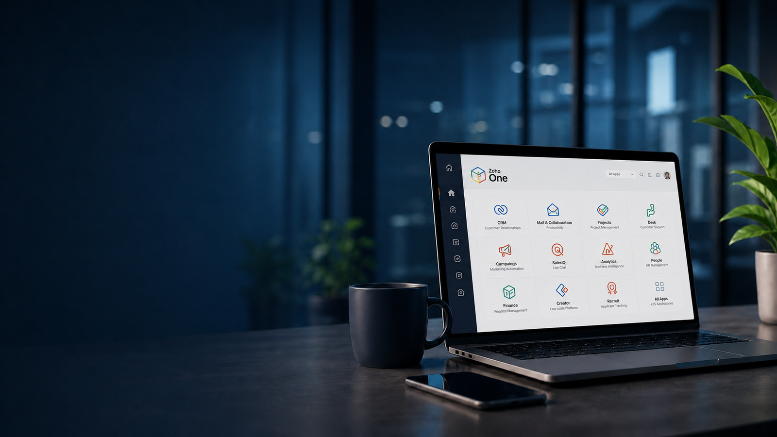 Zoho One dashboard vist på laptop med apps til CRM, marketing, support og projektstyring samlet i ét forretningssystem.